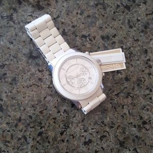 Michael Kors white and silver watch.
